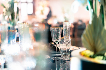 Luxury catering. Wedding or anniversary. Banquet. table served with cutlery, flowers, crockery.