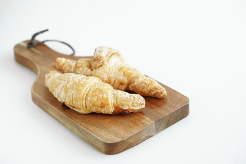Breakfast croissant on white background