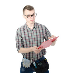Engineer. Young attractive guy and tools.