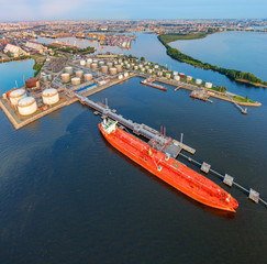 Aerial view large port with railway infrastructure for the delivery of bulk cargo by sea, loading...