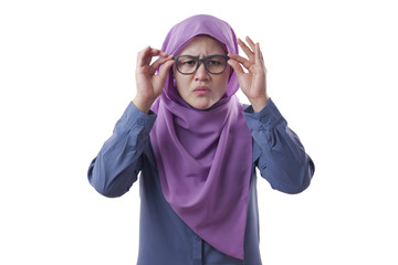 Muslim Businesswoman Adjusting Eyeglasses