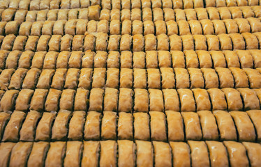 Oriental desserts (baklava) at the market. Food concept background.