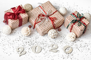 Fototapeta na wymiar New year 2020 white festive background with gift