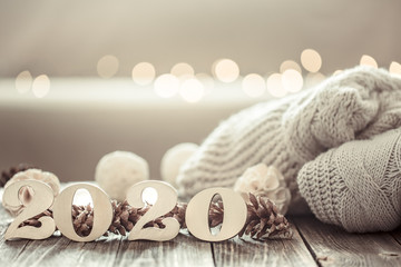 Cozy new year background new year 2020 on wooden background.