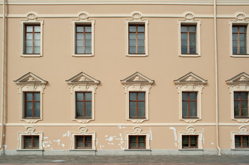 Fototapeta na wymiar Windows of historic building