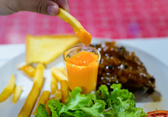 Pork steak, french fries, french fries, potato fries, cheese dip