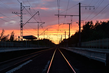 Fototapeta na wymiar railway track , sunset as background