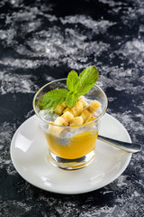 sweet dessert with banana in a glass