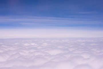 Pattern with sky and fluffy clouds in the background