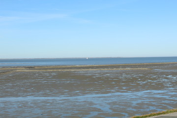 The Wadden Sea near Bensersiel, Northern Germany, at low tide - UNESCO World Heritage Site
