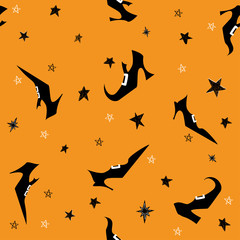 Happy Halloween vector seamless pattern with witch shoes and stars