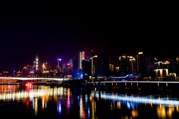 Obraz na płótnie Canvas Night Scenery of High-rise Buildings of Chongqing River-Crossing Bridge in Asia