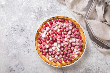 Cooking the cake with custard and raspberries. Berry baking. Summer tart.