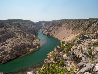 Croatia, august 2019: Aerial view of river Zrmanja in Zadar county, the river flows to Adriatic sea, Zrmanja canyon