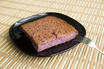 Cottage cheese berry pie with powdered sugar on a plate