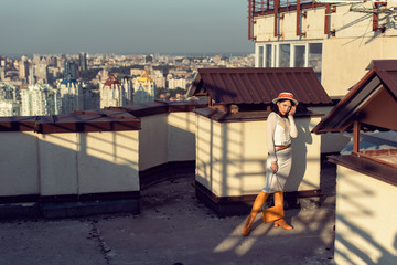 Stylish young girl in an autumn look