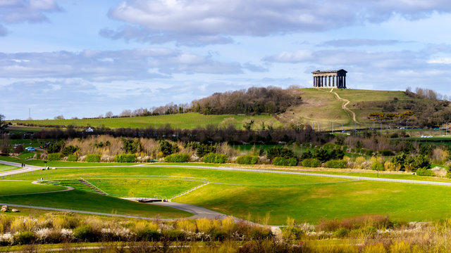 Penshaw Monument located on Penshaw Hill in Sunderland.  Scene shows Penshaw Monument in the background with the beautiful landscape of Herrington Country Park in the foreground.