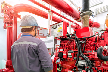 Engineer check generator pump for water sprinkler piping and fire protection system.
