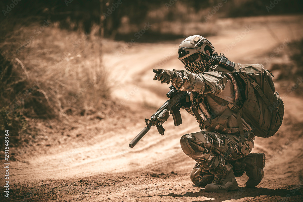 Wall mural Soldiers of special forces on wars at the desert,Thailand people,Army soldier Patrolled the front line