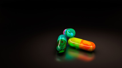tabletki w kapsułkach na czarnym tle