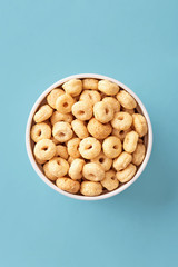 Breakfast cereals in a bowl viewed from above. Top view