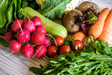 Vegetables and fruits background large colorful assorted mix group overhead vertical in studio