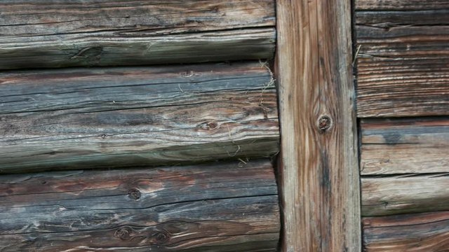 Rustic wooden balk wall background. Log cabin wall background. Old brown wall of rural house.