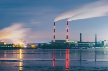 Obraz premium industrial night city view. winter cityscape