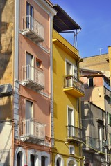 Fototapeta na wymiar Gaeta, Italy - DECEMBER 26, 2018: Beautiful colorful buildings with balconies, old city.