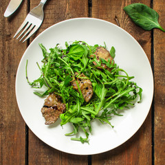 healthy salad with liver (tasty appetizer) menu concept. food background. copy space. Top view