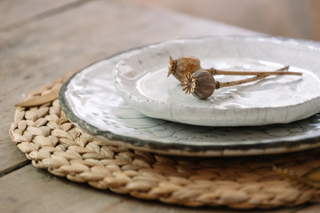 Table setting with plates, tableware and cutlery