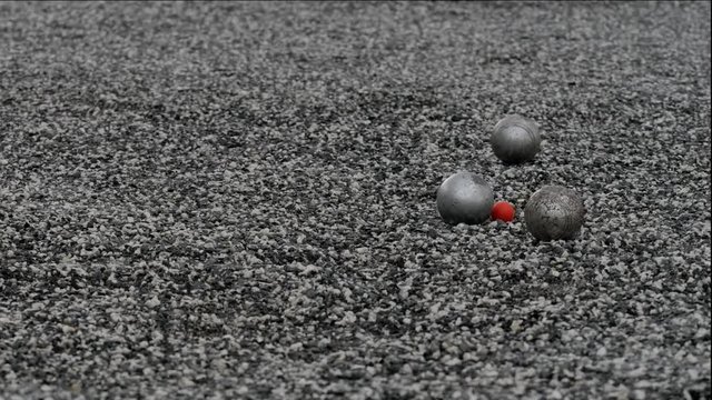 Slow mation of Steel ball or Petanque ball roll to hit other ball