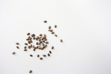 Chia seeds on a white background