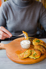 food lunch potato pancakes sour cream