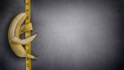 diet concept image of banana hugging another banana on a plate weight loss challenge