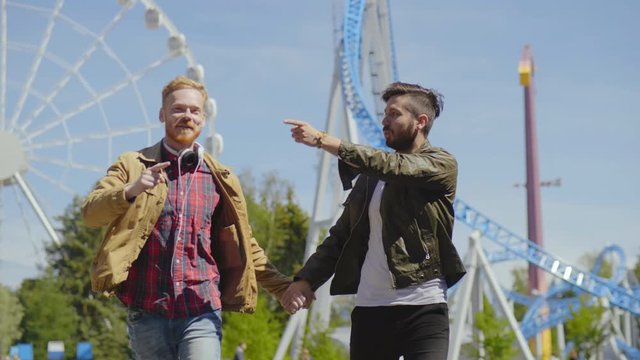 Gay couple chooses attraction to ride in theme park