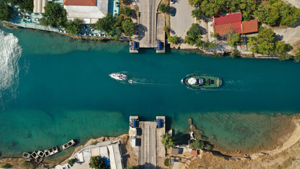 Fototapeta na wymiar Aerial photo taken by drone of Corinth Canal of Isthmos or Isthmus connecting mainland with Peloponnese, Greece