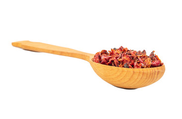 Dry red pepper in spoon