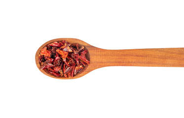 Dry red pepper in spoon