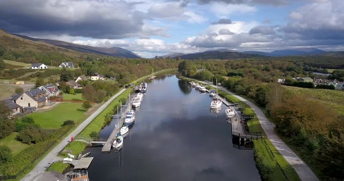 aerial footage of neptune's staircase leading to the caledonian canal in fort william and banavie in the argyll and lochaber region of the highlands of scotland in autumn