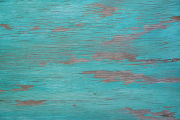 Bois texturé avec peinture turquoise ancienne