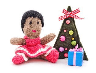 Knitted doll and Christmas tree with gift.