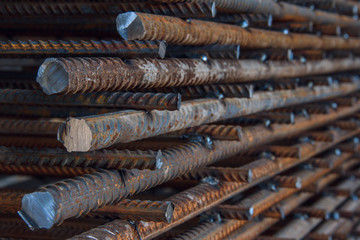 Industrial background. Rebar texture. Rusty rebar for concrete pouring. Steel reinforcement bars. Construction rebar steel work reinforcement. Closeup of Steel rebars.