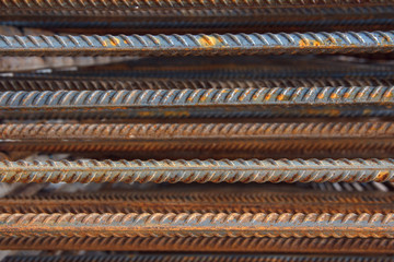 Industrial background. Rebar texture. Rusty rebar for concrete pouring. Steel reinforcement bars. Construction rebar steel work reinforcement. Closeup of Steel rebars.