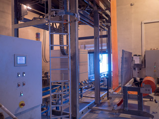 Plant for production of aerated concrete building blocks according to German technology..Equipment supplied by German company. Pipe, mixing drums, drying chambers, conveyors for moving