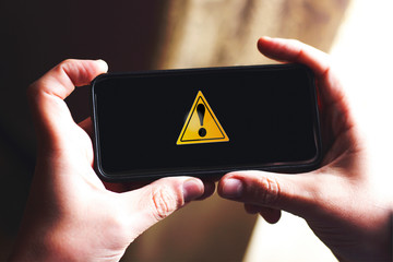 alert symbol design on smart phone screen