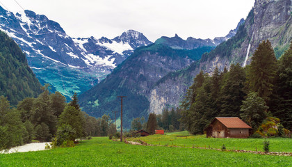 Fototapeta na wymiar Switzerland. Alpine landscape in Grindelwald with snowy mountains in summer