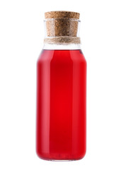 Red glass bottle of juice or compote on a white isolated background. Homemade lemonade carafe on a white background.