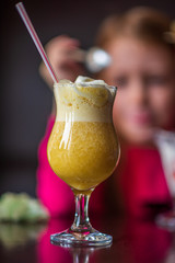 Banana cocktail with ice cream. Photographed close-up.