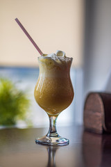 Banana cocktail with ice cream. Photographed close-up.